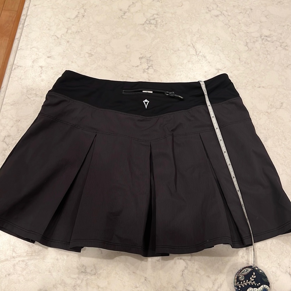 Gently worn Ivivva skirt with built in shorts